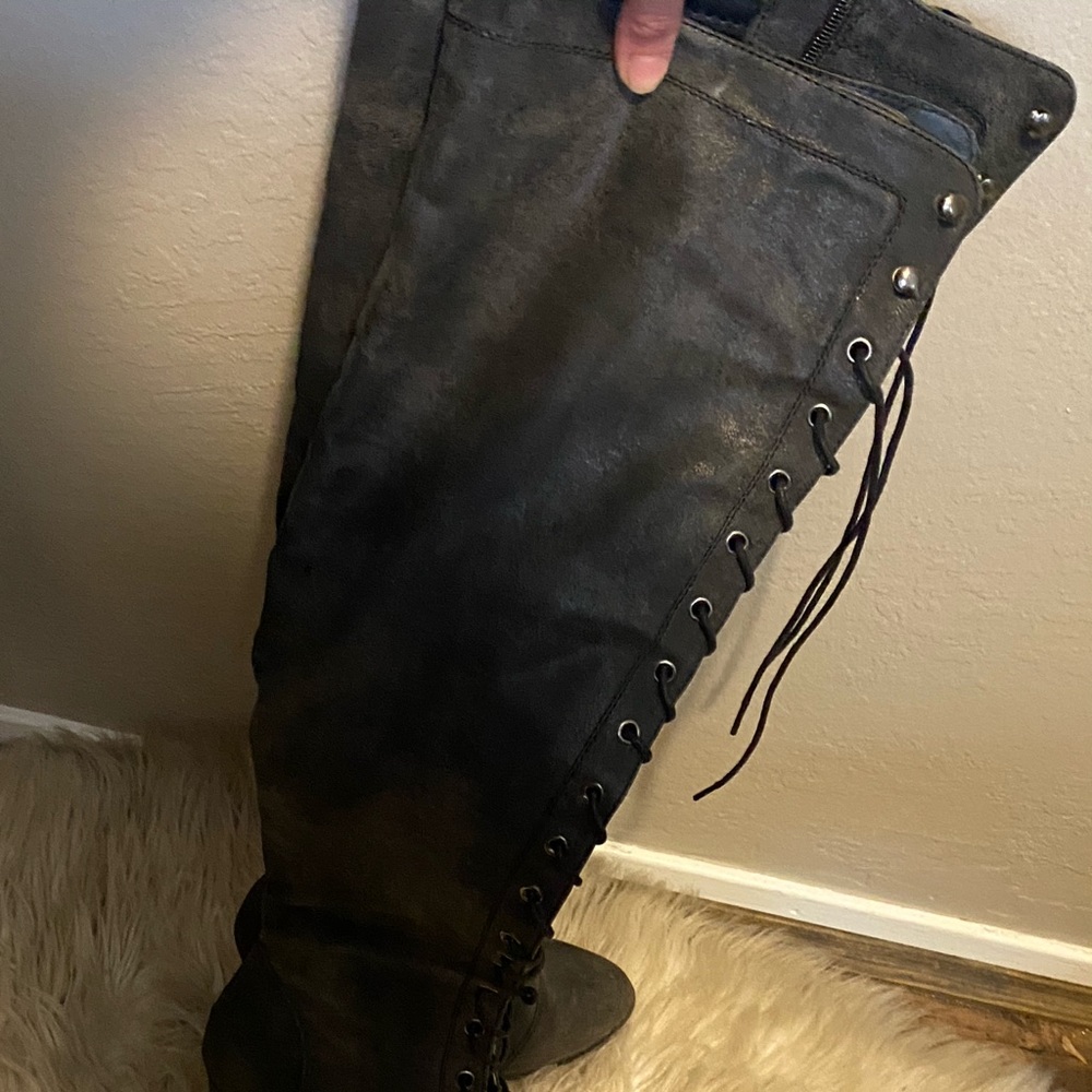 Tue up over the knee boots